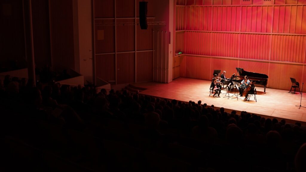 The audience listens to the Afternoon of Fauns concert in the Small Auditorium.